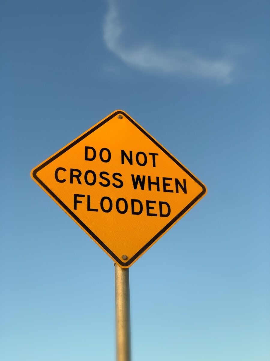 a yellow sign with black text