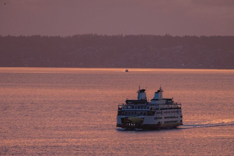 a large boat traveling across a large body of water