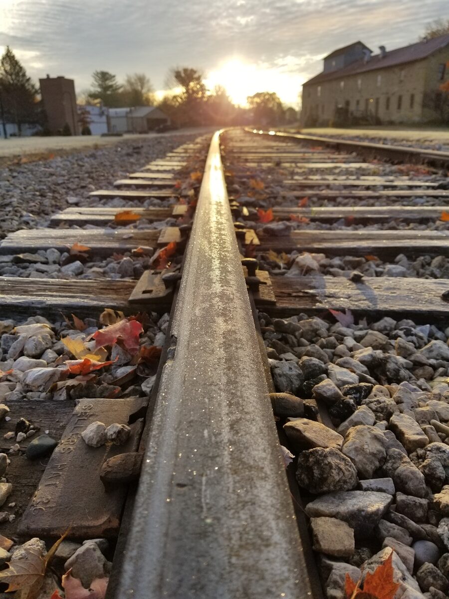 a railroad track with rubble